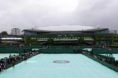 Wimbledon feiert Comeback mit traditioneller Regen-Verzögerung Wimbledon feiert Comeback mit traditioneller Regen-Verzögerung