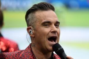 Robbie Williams bekommt eine Glatze verpasst