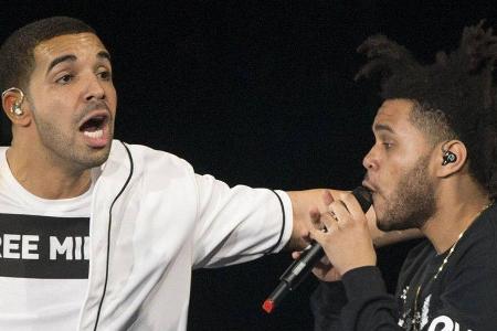 Drake und The Weeknd sind kanadische Superstars. Drake und The Weeknd sind kanadische Superstars.