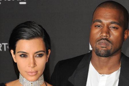 Kim Kardashian und Kanye West wenige Monate nach ihrer Hochzeit im Jahr 2014 Kim Kardashian und Kanye West wenige Monate nach ihrer Hochzeit im Jahr 2014