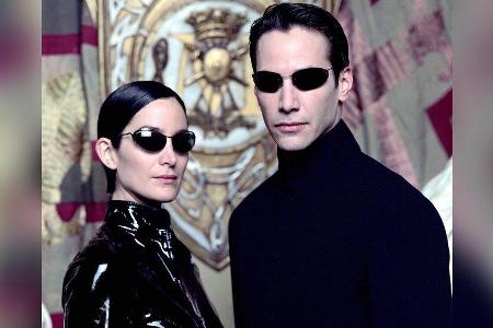 Kennen sich im neuen Teil nicht mehr: Carrie-Anne Moss und Keanu Reeves als Trinity und Neo in Kennen sich im neuen Teil nicht mehr: Carrie-Anne Moss und Keanu Reeves als Trinity und Neo in