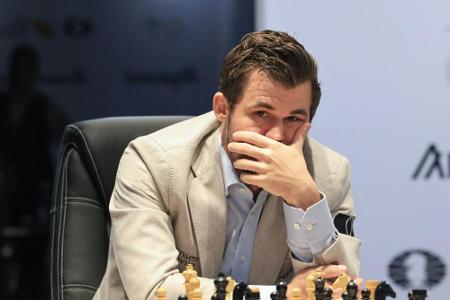 Schach-WM: Carlsen verpasst auch im dritten Duell Sieg Schach-WM: Carlsen verpasst auch im dritten Duell Sieg