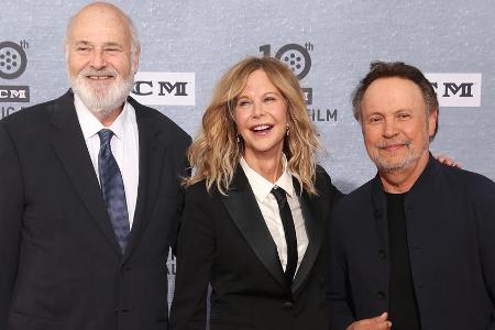 Rob Reiner (v.l.), Meg Ryan und Billy Crystal posieren gemeinsam auf dem roten Teppich