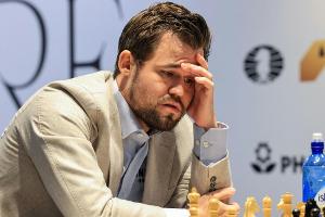 Schach-WM: Carlsen muss sich erneut mit Remis begnügen