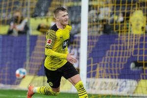 Überragender Reus im Sauwetter: BVB bleibt an Bayern dran