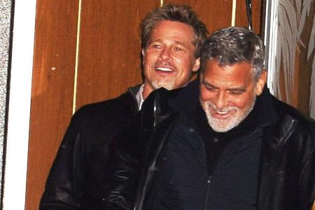 George Clooney und Brad Pitt voller Freude am Set von 