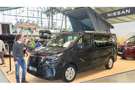 Campervan, Messefoto, Messe, außen, Mann, Aufstelldach, Camper Campervan, Messefoto, Messe, außen, Mann, Aufstelldach, Camper