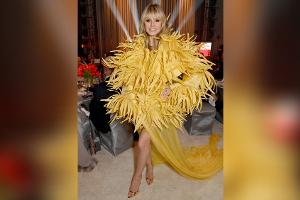 Heidi Klum überrascht in Kanariengelb bei Elton Johns Oscar-Party