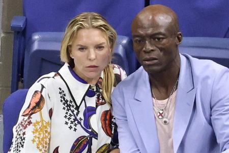 Seltener Auftritt: Seal turtelt mit Partnerin bei den US Open Seltener Auftritt: Seal turtelt mit Partnerin bei den US Open