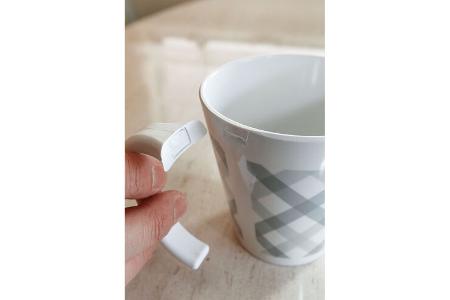 Tasse mit abgebrochenem Henkel
