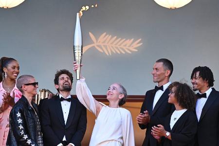 Das Olympische Feuer ist bei den Filmfestspielen von Cannes angekommen Das Olympische Feuer ist bei den Filmfestspielen von Cannes angekommen