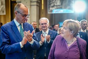 Merkel contra Merz bei Migrations-Wahlkampf