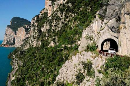 Italy. Lombardy. Lake Garda. Tremosine. tunnel & road climbing to village of Pieve. Italy. Lombardy. Lake Garda. Tremosine. tunnel & road climbing to village of Pieve.