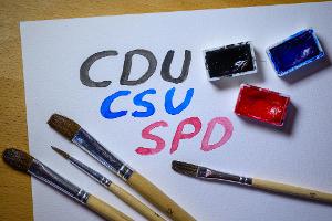 CDU, CSU und SPD wollen am Montag wieder zusammenkommen. (Symbolbild)
