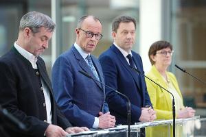 Verbände: Licht und Schatten in Plänen von Union und SPD