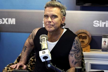 Robbie Williams singt neue FIFA-Hymne Robbie Williams singt neue FIFA-Hymne